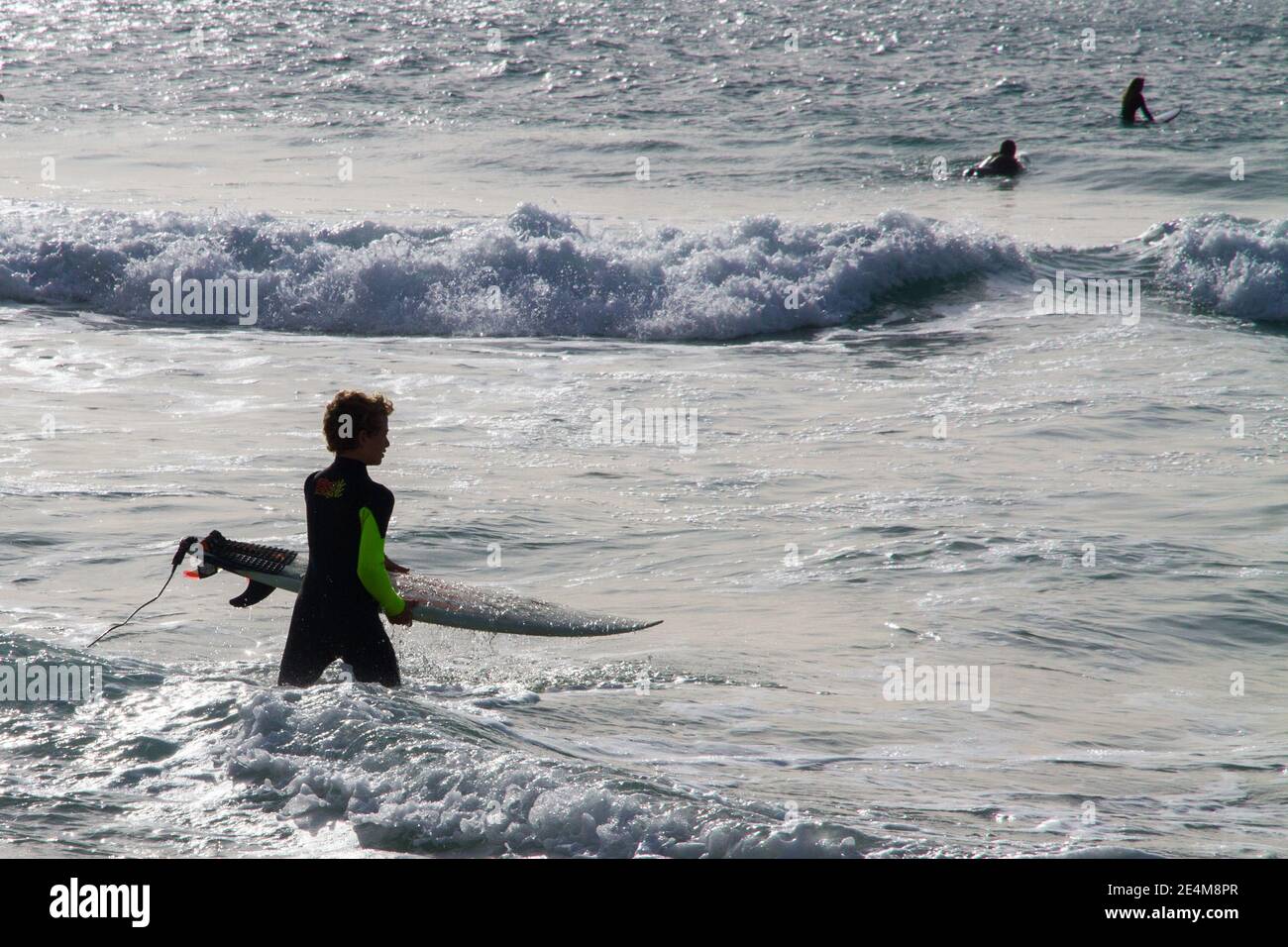 Surfer boys surf board. Mallorca Spain Stock Photo