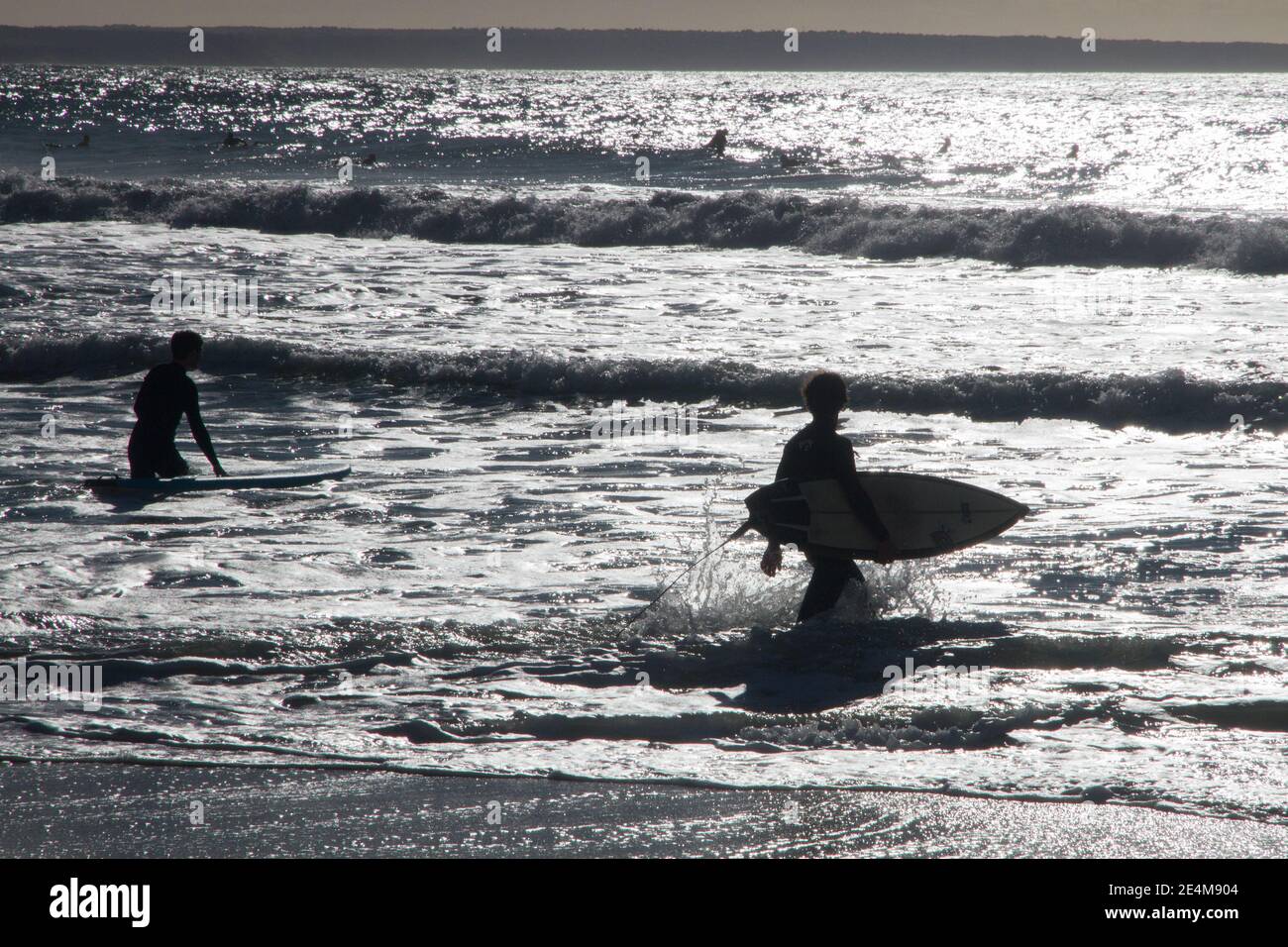 Surfer boys surf board. Mallorca Spain Stock Photo