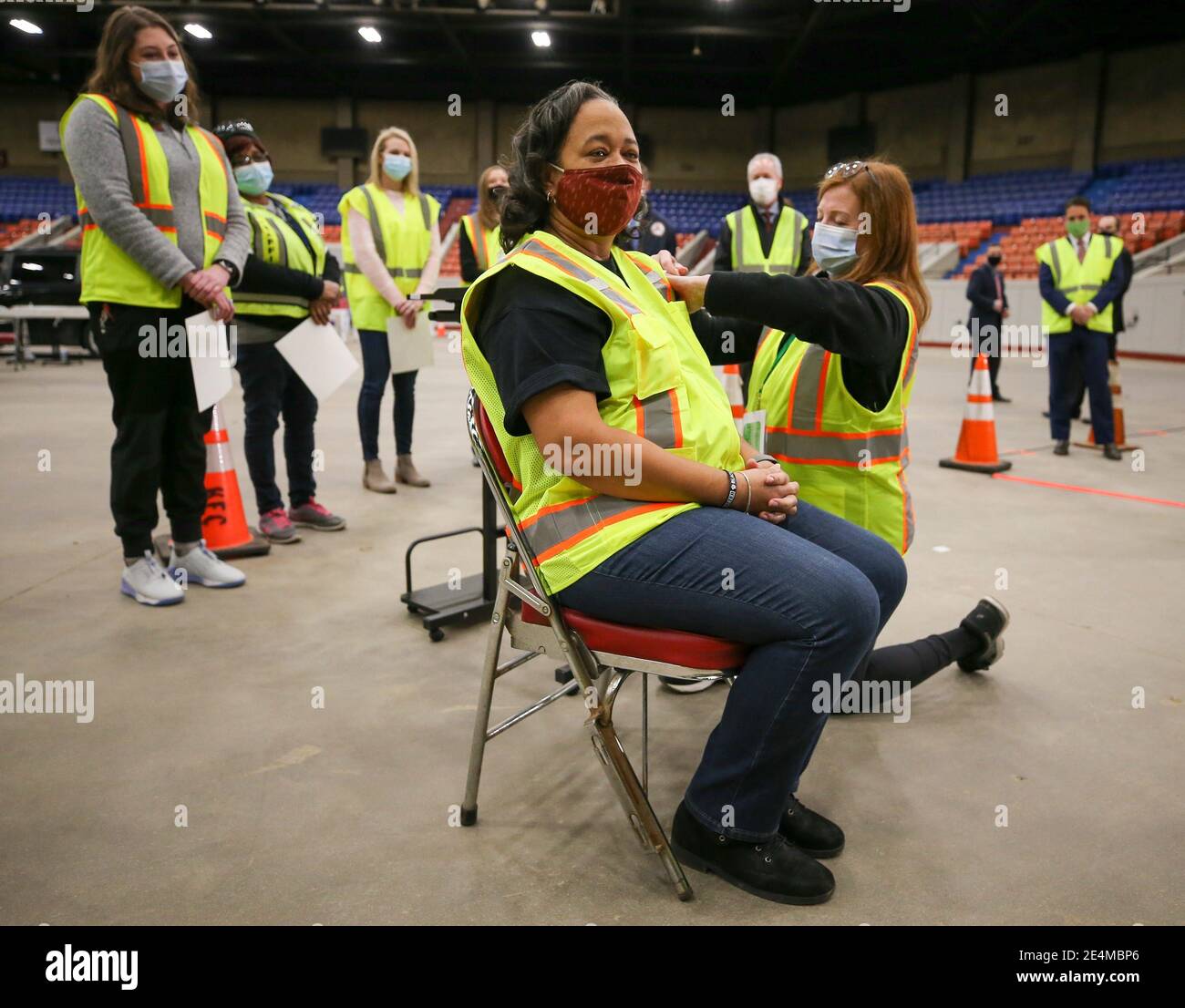 Atkinson Elementary special education teacher Tonya Moore gets vaccinated by volunteer Laura Kinney on Friday, January 22, 2021 at Broadbent Arena. Jcpsvaccine15 (Photo by Michael Clevenger/Courier Journal/USA Today Network/Sipa USA) Stock Photo