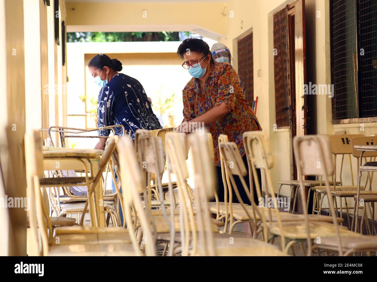 Colombo, Sri Lanka. 24th Jan, 2021. People clean up at a school in 