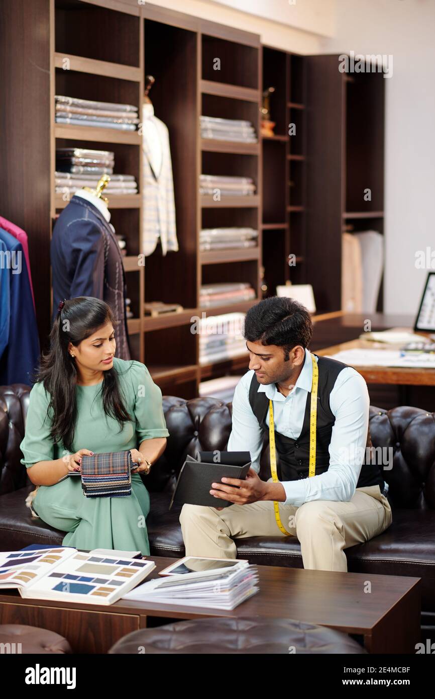 Tailor showing fabric catalog hires stock photography and images Alamy