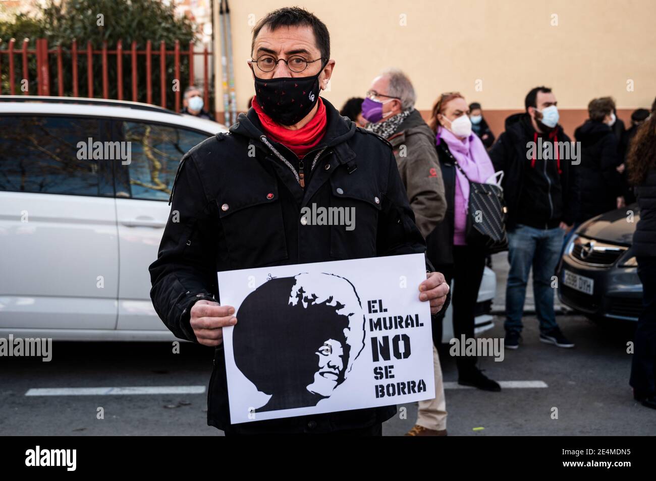 Juan Carlos Monedero, former leading member of Podemos party holding a placard with the picture of Angela Davis and the words 'the mural should not be erased', during a protest against the removal proposed by far-right party VOX of a feminist mural named 'Union makes force'. In the mural appear the faces of 15 women who are part of history for their fight in favor of equality: Angela Davis, Frida Kahlo, Nina Simone, Rigoberta Menchu, Lucia Sanchez Saornil, Rosa Arauzo, Valentina Tereshkova, Chimamanda Ngozi, Emma Goldman, Kanno Sugato, Liudmila Pavlichenko, Billy Jean King, Gata Cattana, Rosa Stock Photo