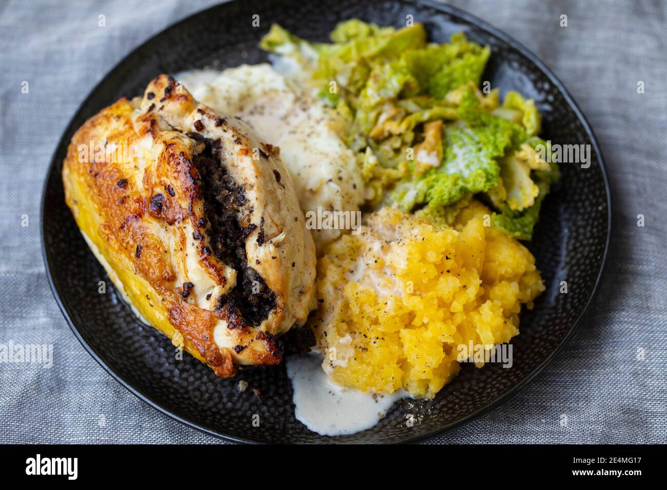 Chicken balmoral, stuffed with haggis with tatties and neeps, Burns Night meal Stock Photo