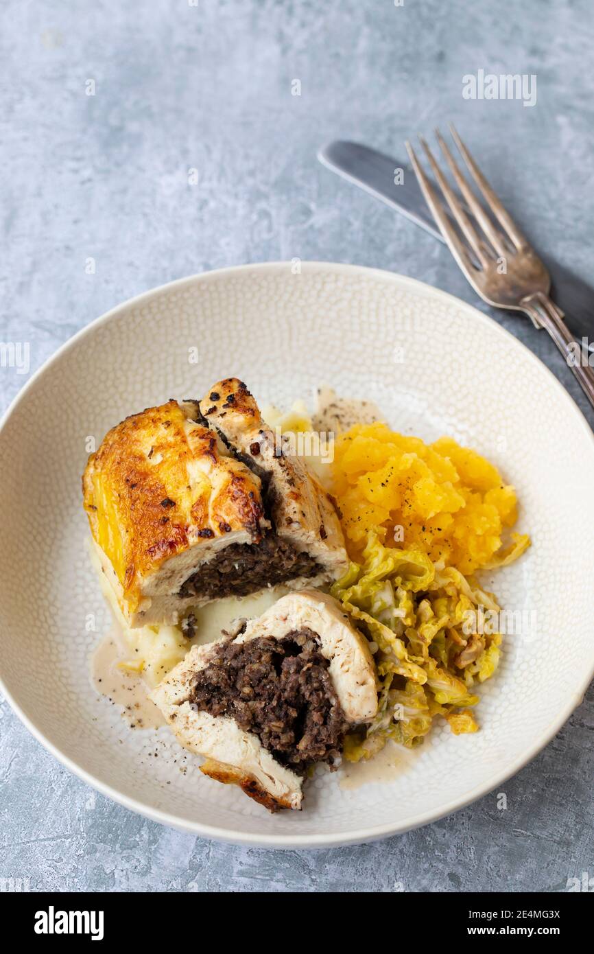 Chicken balmoral, stuffed with haggis with tatties and neeps, Burns Night meal Stock Photo