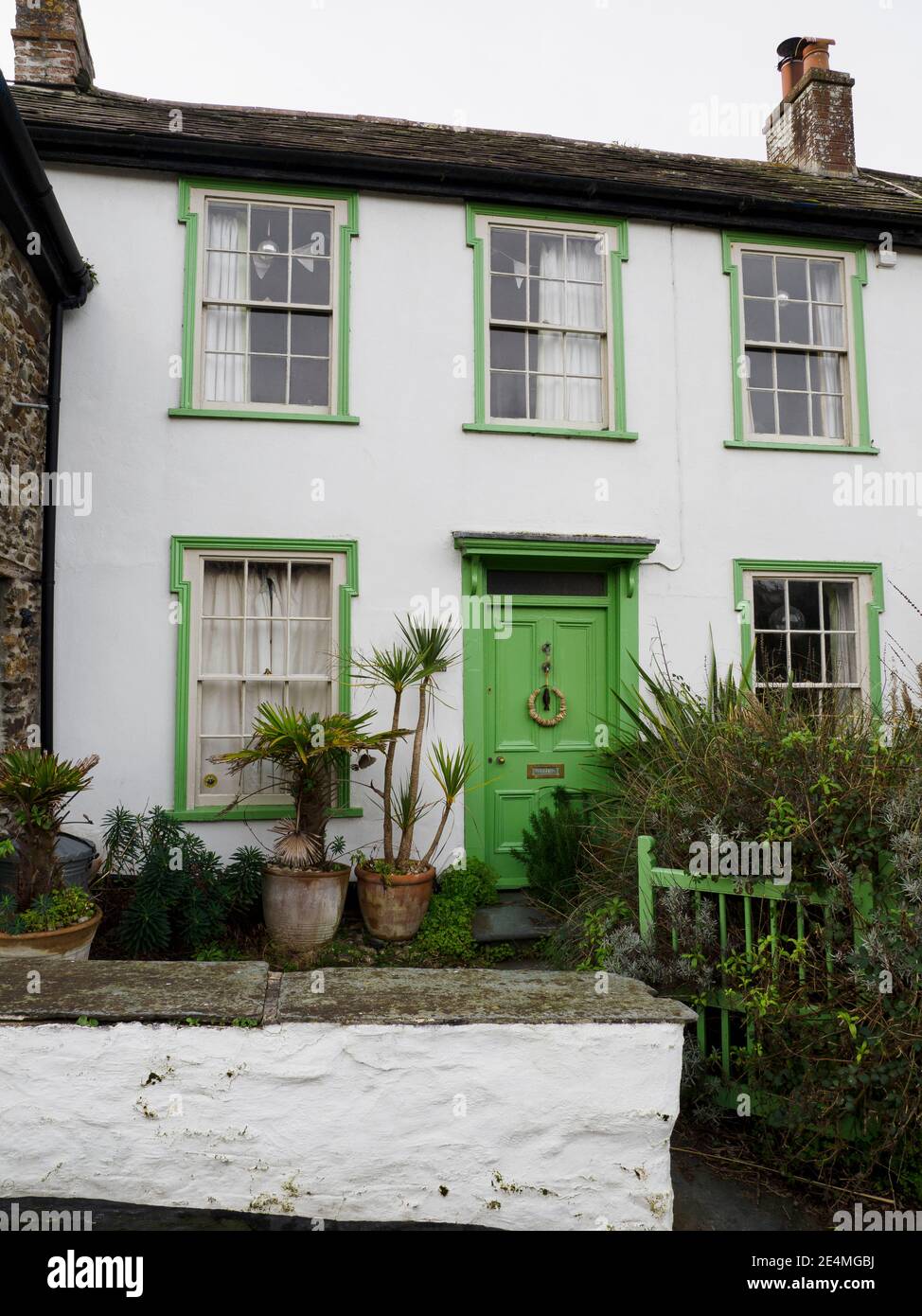 Cornish house with unusual window frames, Port Isaac, Cornwall, UK