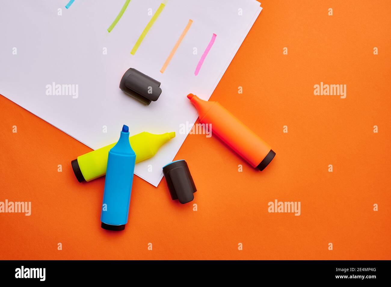 Colorful permanent markers on paper sheet Stock Photo Alamy