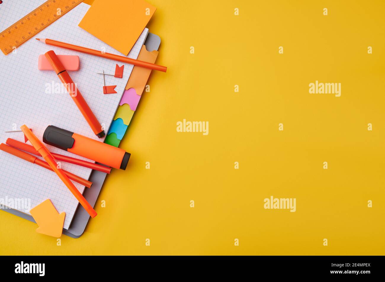 Office stationery supplies on opened notepad Stock Photo