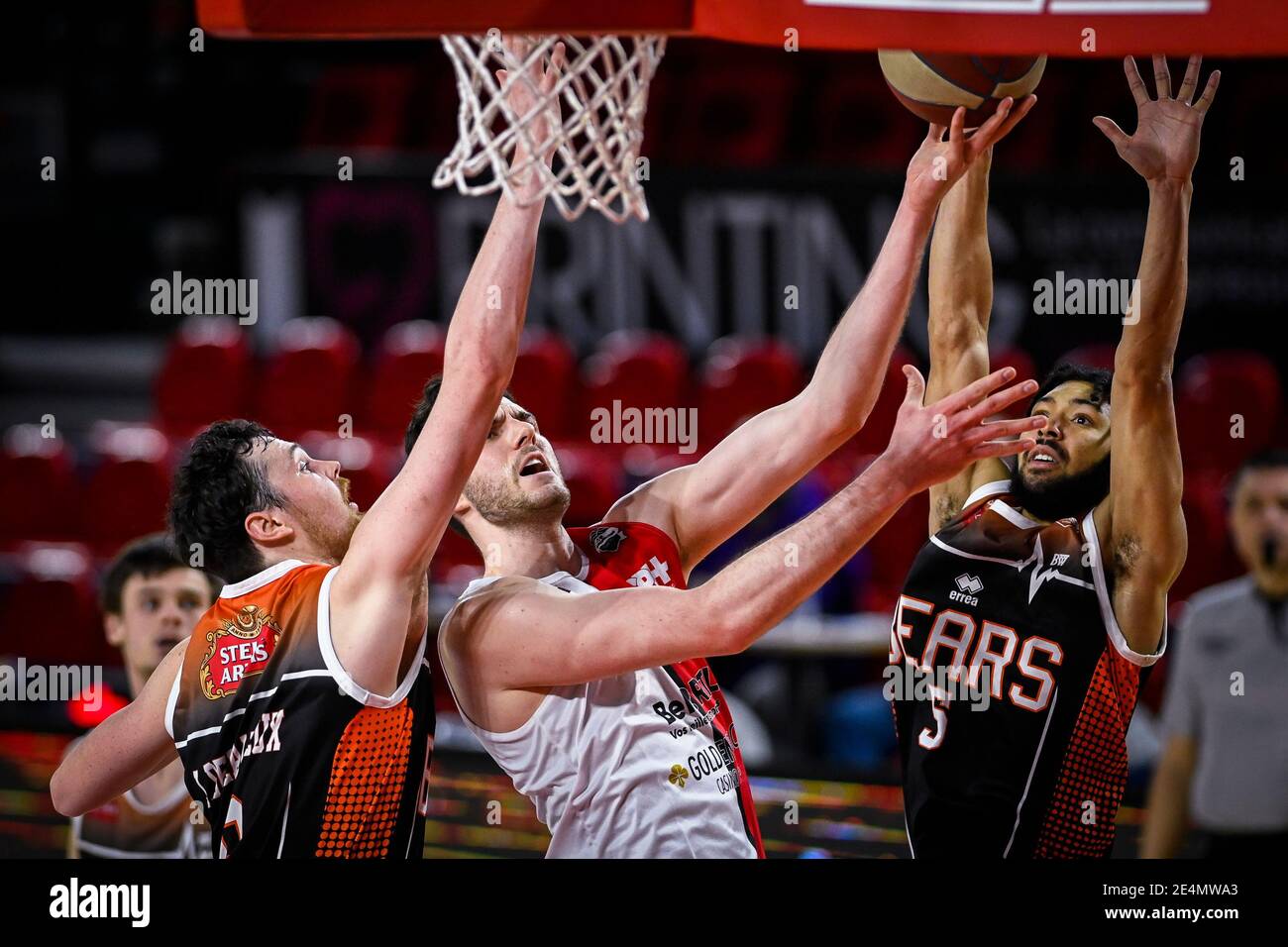 Leuven's Jonas Delalieux, Spirou's Gyorgy Goloman and Leuven's Jos Heath pictured in action during the basketball match between Spirou Charleroi and L Stock Photo