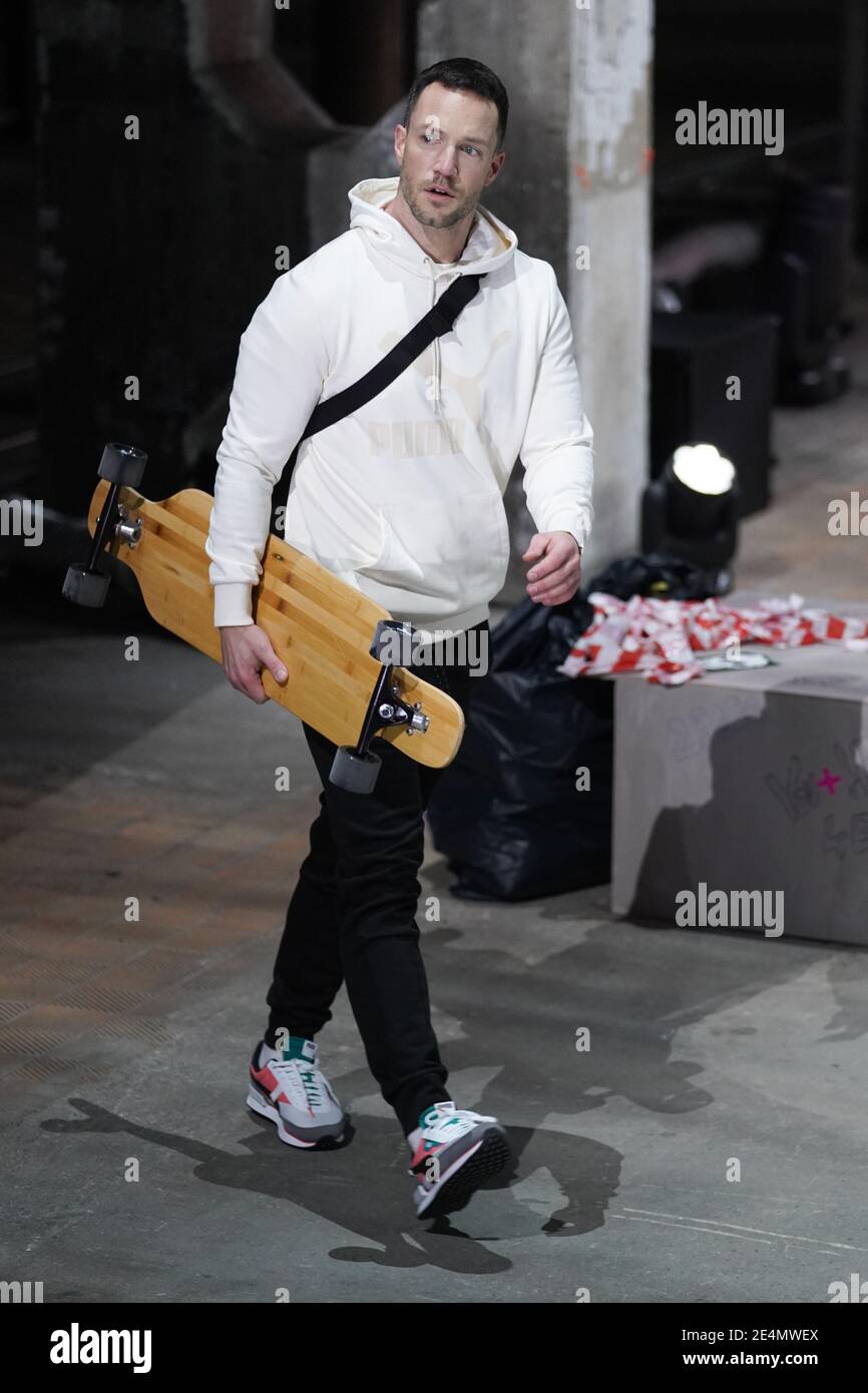 Berlin, Germany. 23rd Jan, 2021. Influencer Daniel Fuchs shows a creation  by Puma for the fall/winter season 2021/2022 during the About You Fashion  Week at Kraftwerk in Köpenicker Straße. This time the