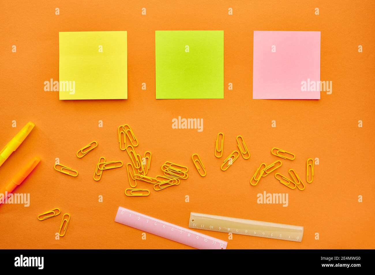 Paper clips, notepad and ruler closeup, stationery Stock Photo - Alamy