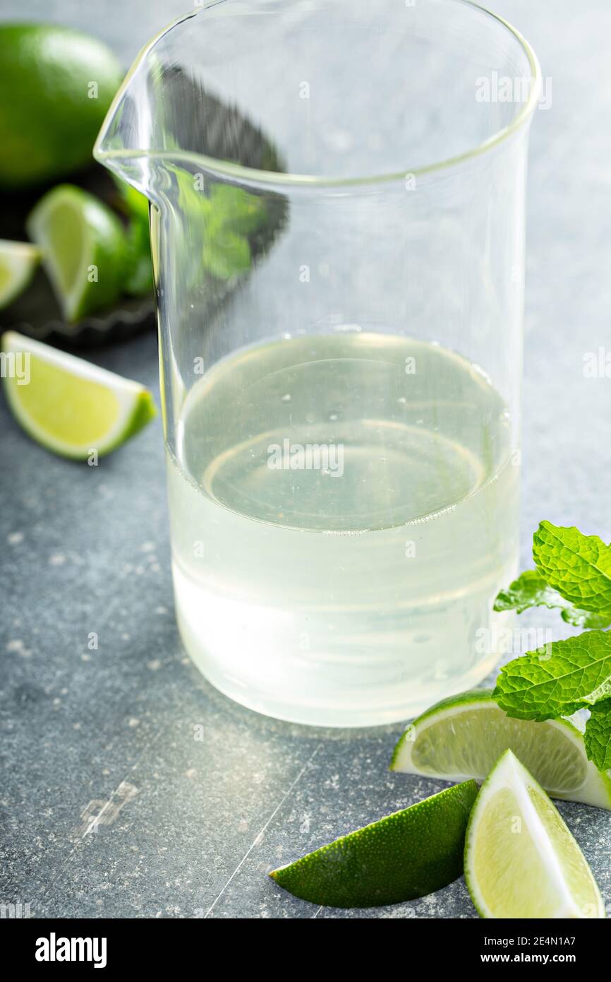 Making mojito cocktail with mint simple syrup Stock Photo Alamy