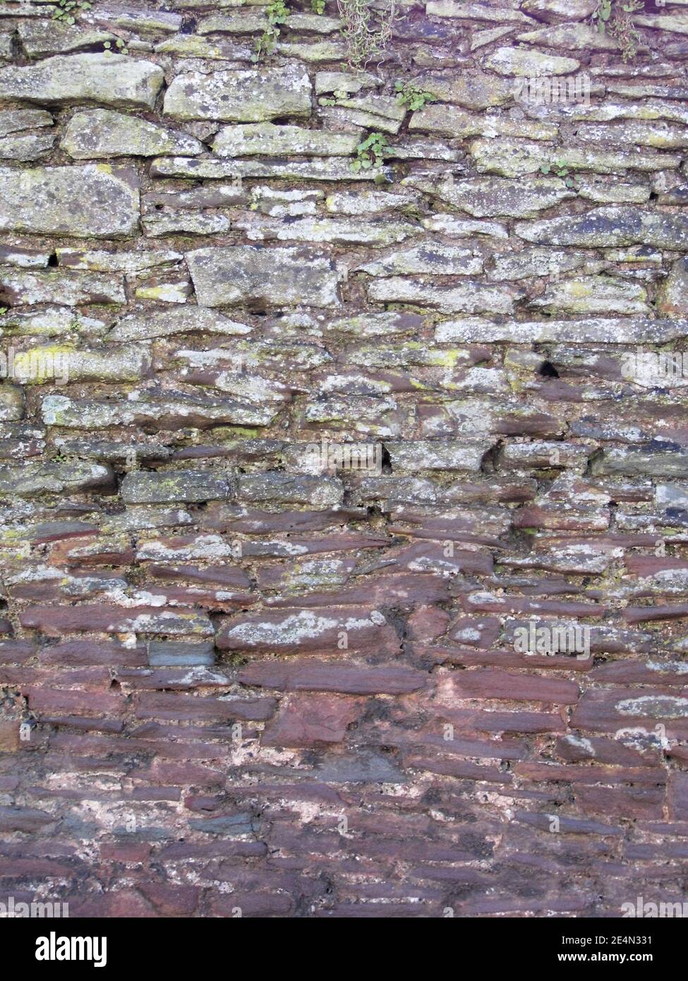 Old stone wall texture background Stock Photo - Alamy