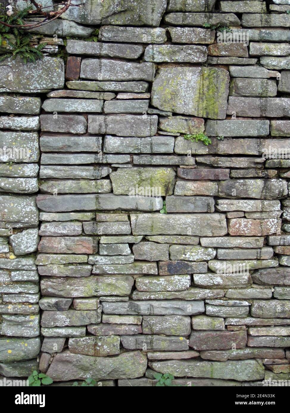 Old stone wall texture background Stock Photo - Alamy