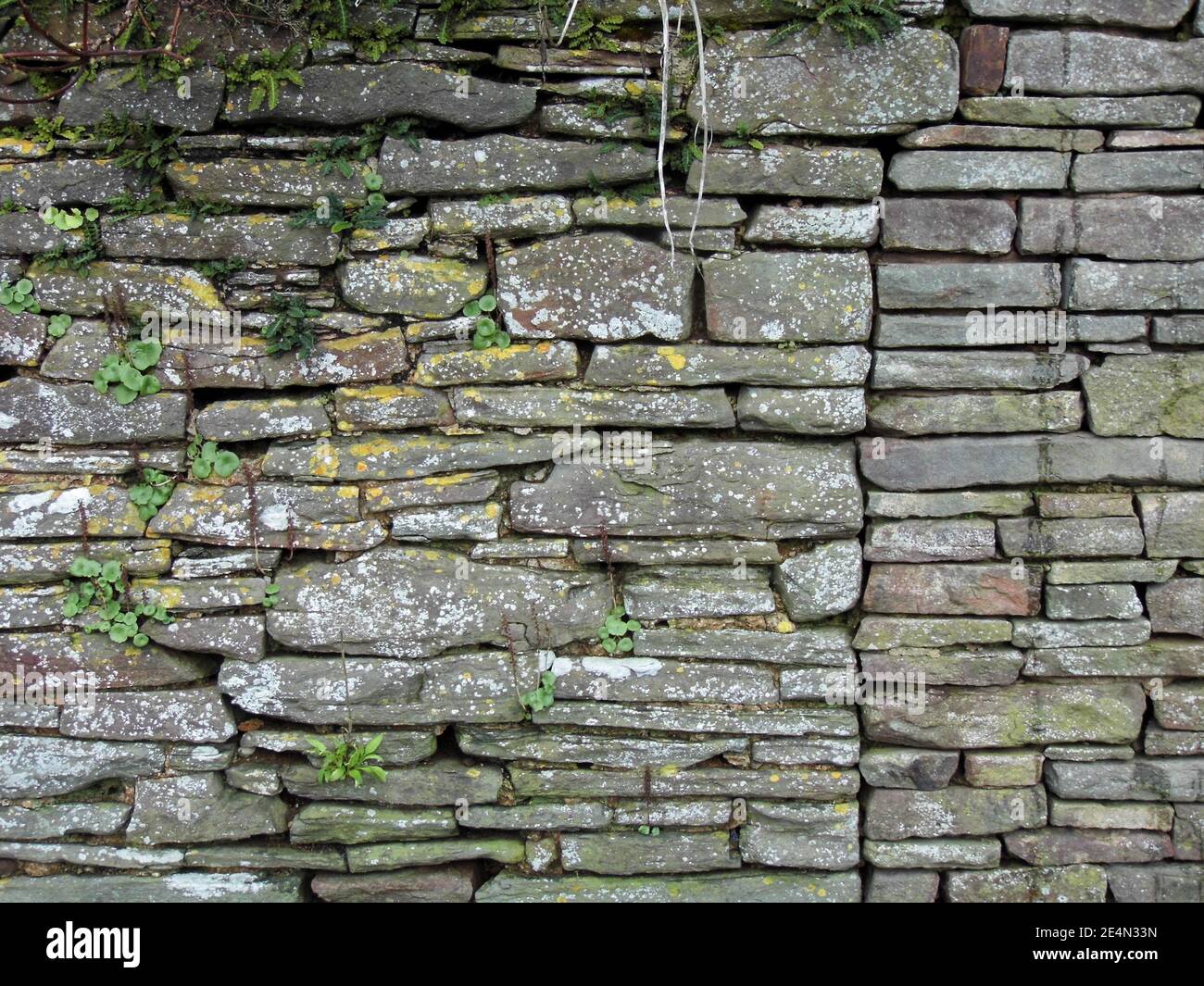 Old stone wall texture background Stock Photo - Alamy