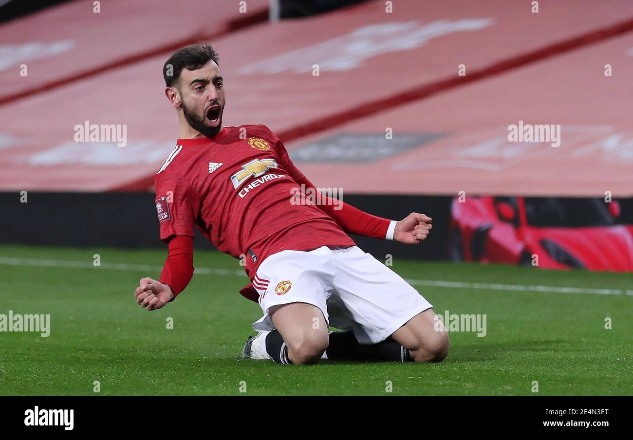 Manchester United's Bruno Fernandes celebrates scoring his side's third goal of the game during the Emirates FA Cup fourth round match at Old Trafford, Manchester. Picture date: Sunday January 24, 2021. Stock Photo