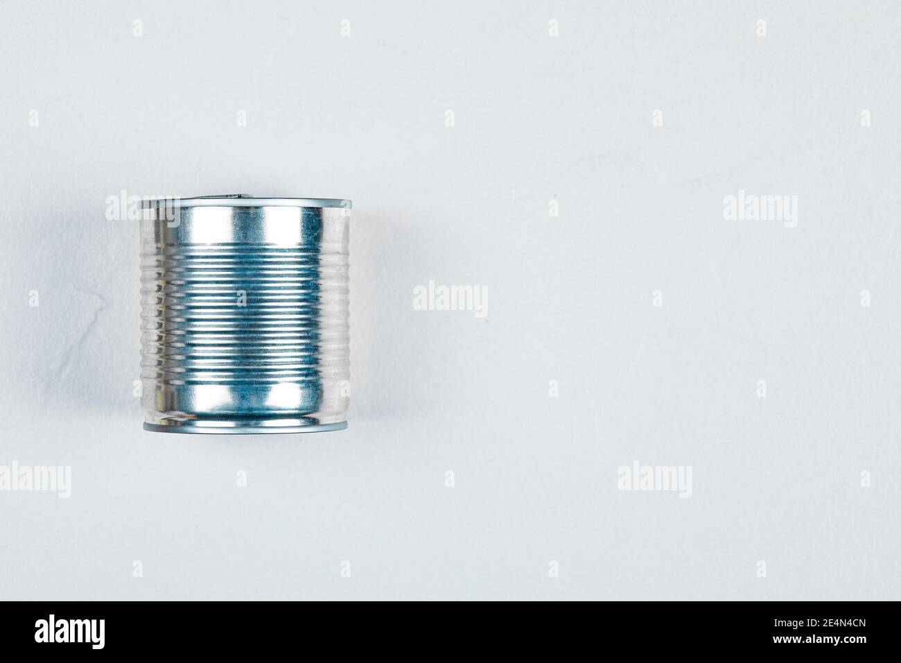 Closed tin can on a white background Stock Photo