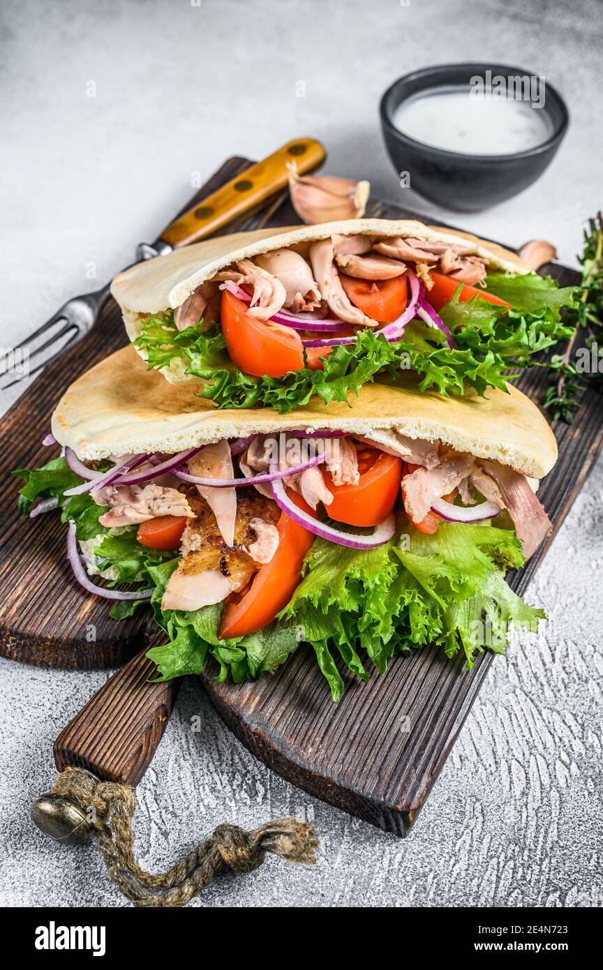 Pita sandwich with roasted chicken, vegetables and delicious sauce