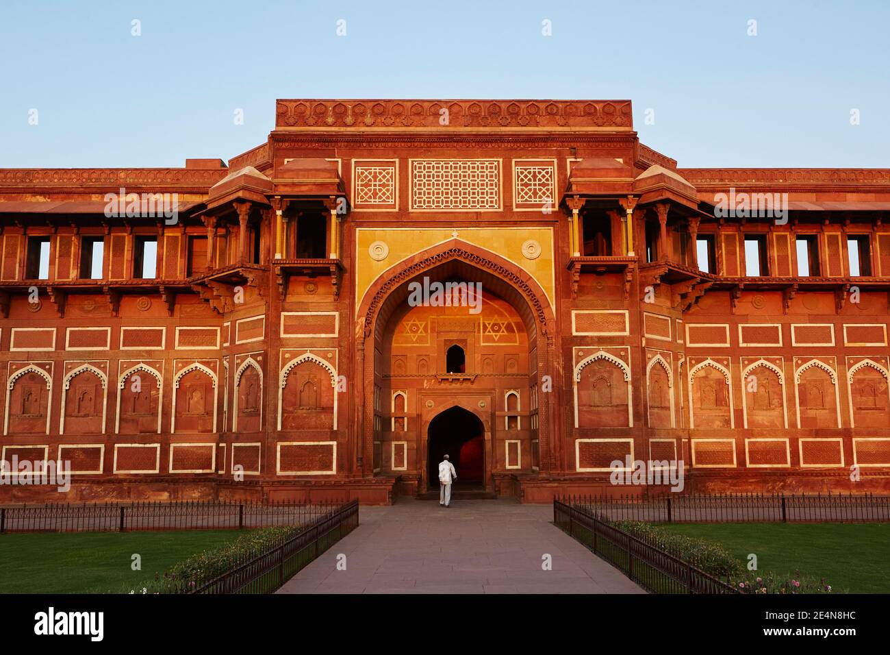 A wide shot of a man walking into Jahangir Mahal inside Agra Fort in Agra, Uttar Pradesh, India. Stock Photo