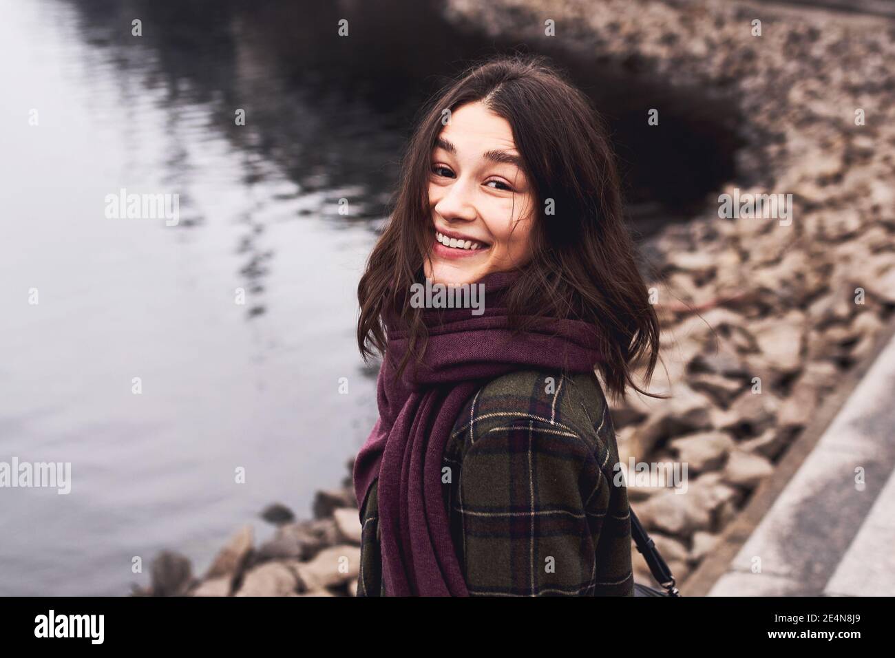 Happy smiling brunette woman Stock Photo - Alamy