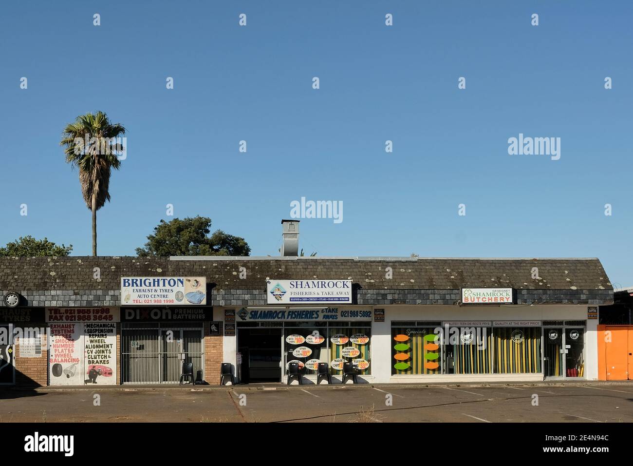 Street scene of shops in Kraaifontein (Brighton rd.) in the Northern Suburbs of Cape Town, South Africa during the Covid-19 pandemic. Stock Photo