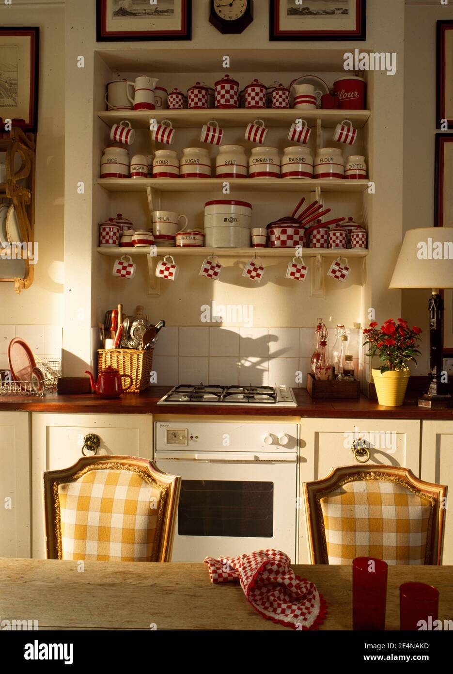 Detail of kitchen diningroom with collection of storage jars and