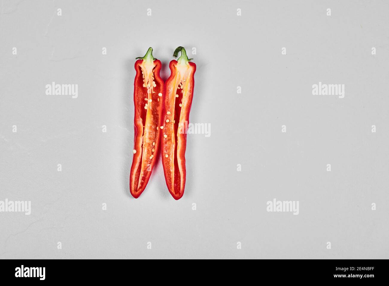Red hot chili pepper isolated on white background Stock Photo - Alamy