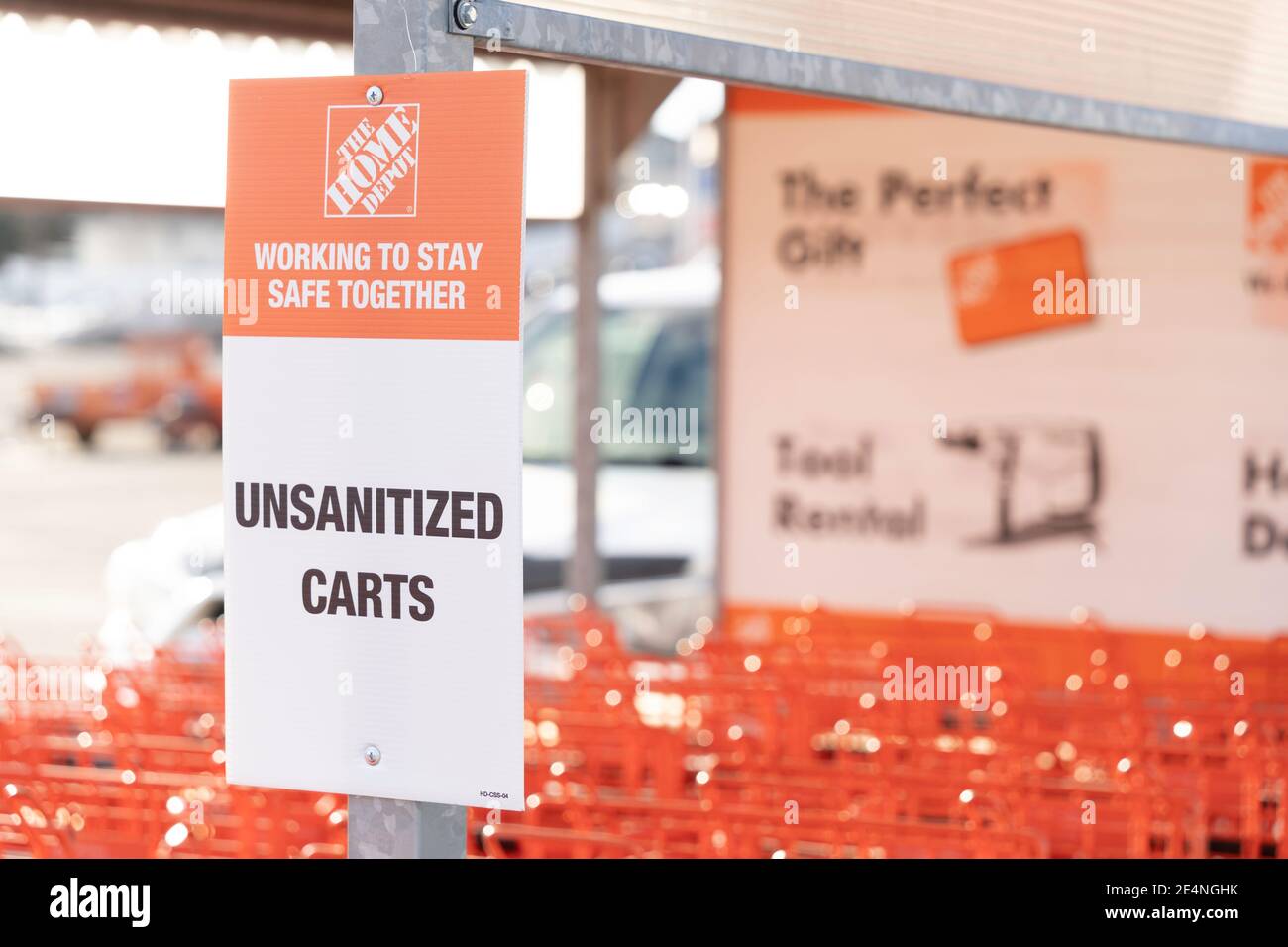 January 16 2021 - Calgary , Alberta Canada - Unsanitized Home depot orange shopping carts - Covid 19 pandemic measures Stock Photo