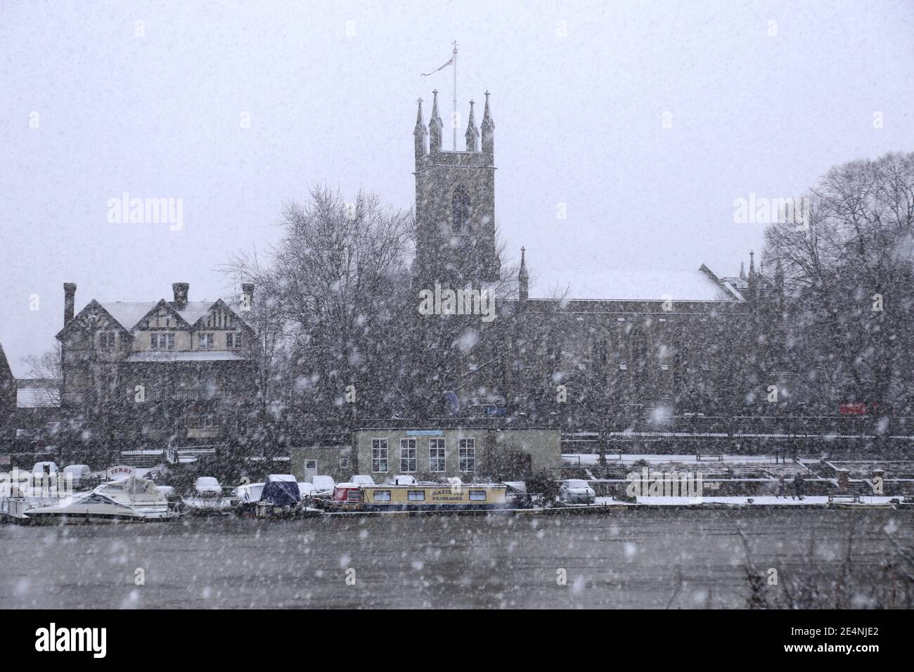 St Mary's Church at Hampton during heavy snow, seen from Sadlers Ride, Hurst Park, East Molesey, Surrey, England, Great Britain, UK, Europe Stock Photo
