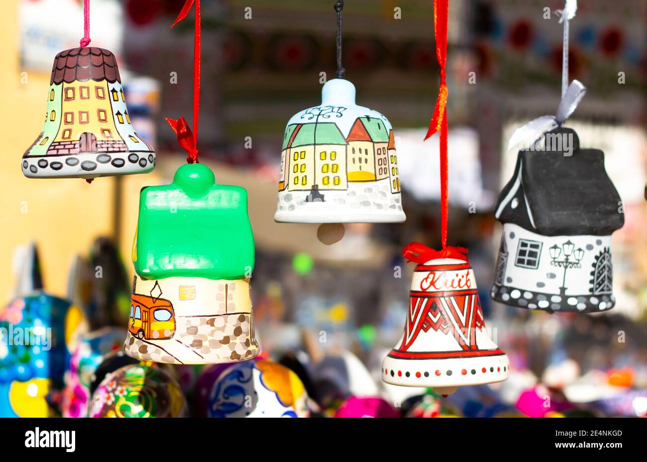 Handmade painted Christmass bells exposed for sale at Andriivs'kyi descent steet market in Kyiv, Ukraine Stock Photo