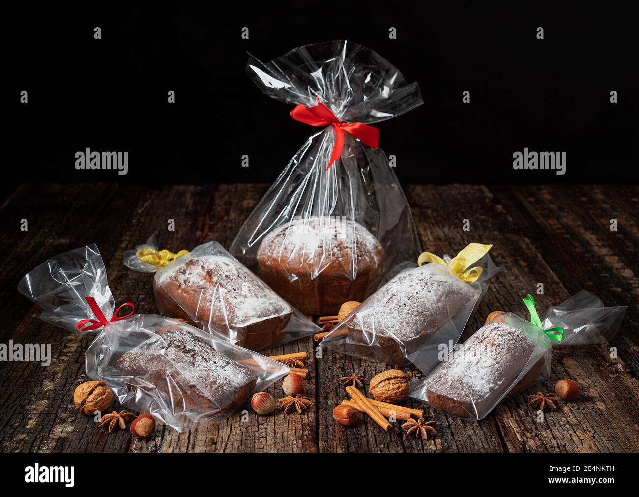 Christmas gift stollen bread, in plastic packaging and a ribbon, laid