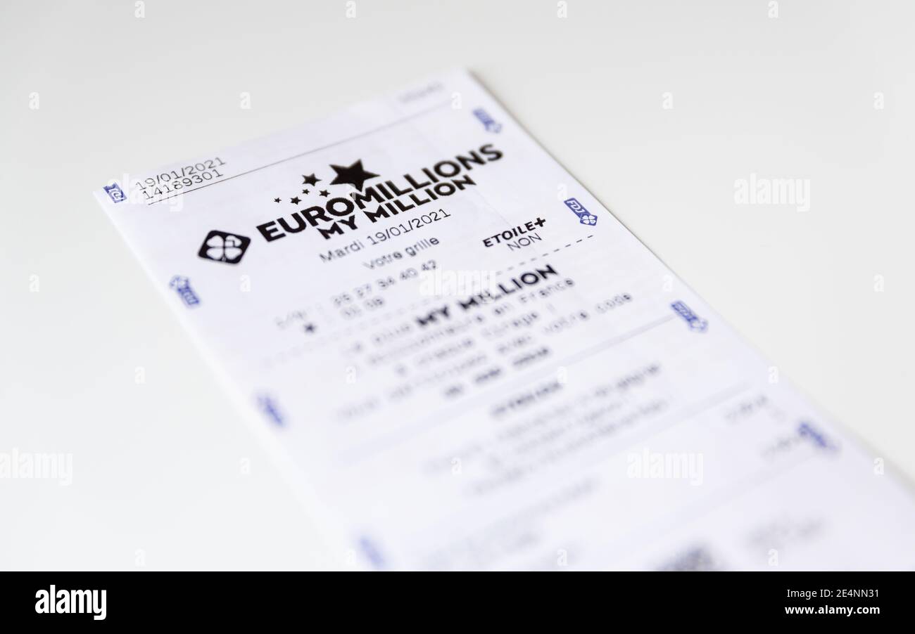 Francaise des Jeux Euromillions receipt on white background. EuroMillions is a European transnational lottery, it was launched in 2004. Stock Photo
