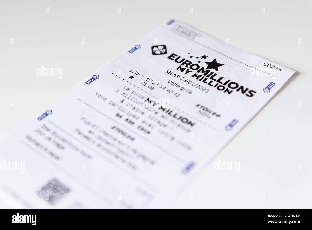 Francaise des Jeux Euromillions receipt on white background. EuroMillions is a European transnational lottery, it was launched in 2004. Stock Photo