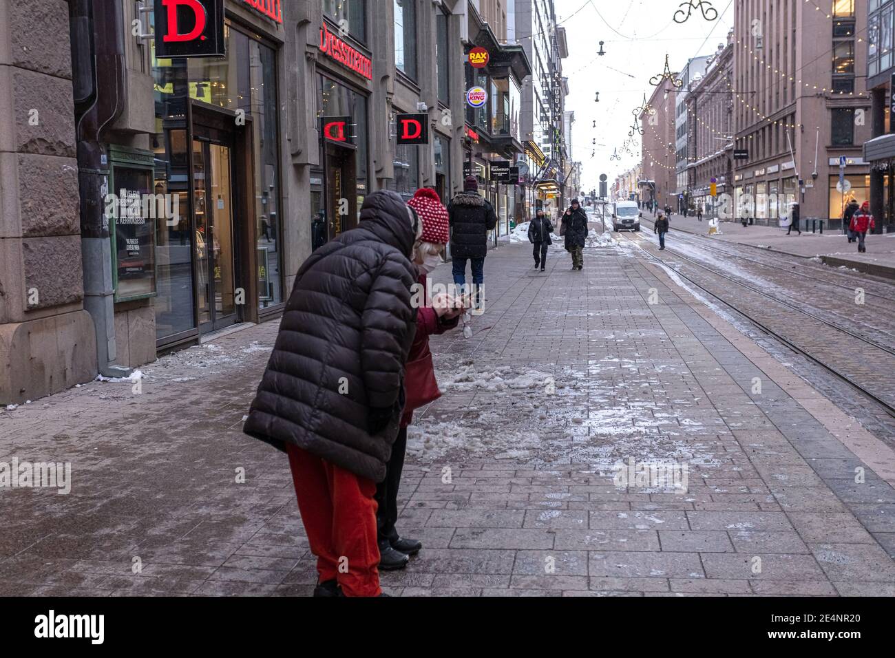 Helsinki. Finland. January 19, 2021 Two girlfriends are on the street, older women take a selfie. High quality photo Stock Photo