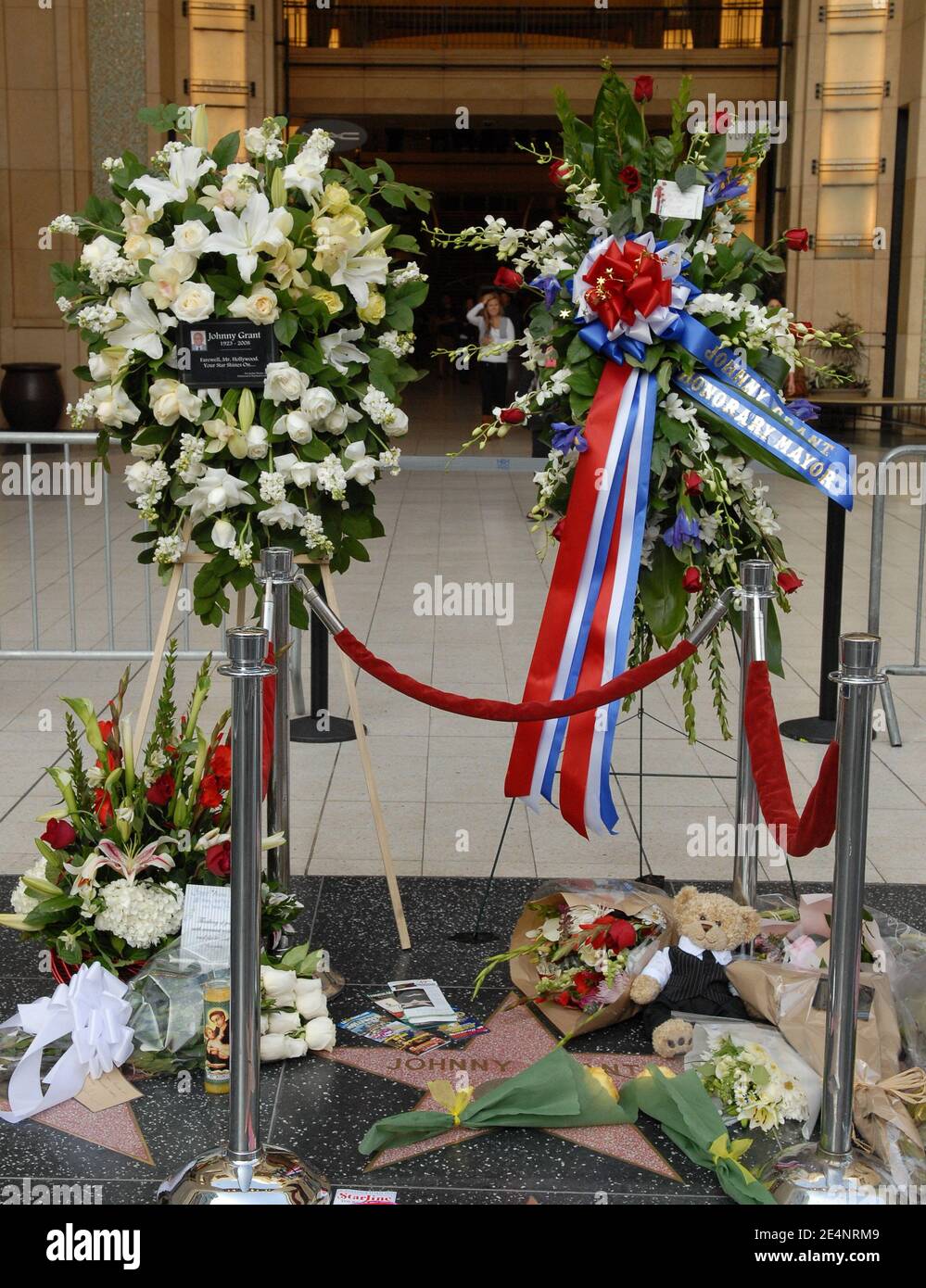 Tribute to Johnny Grant with flowers on one of his two Hollywood Walk