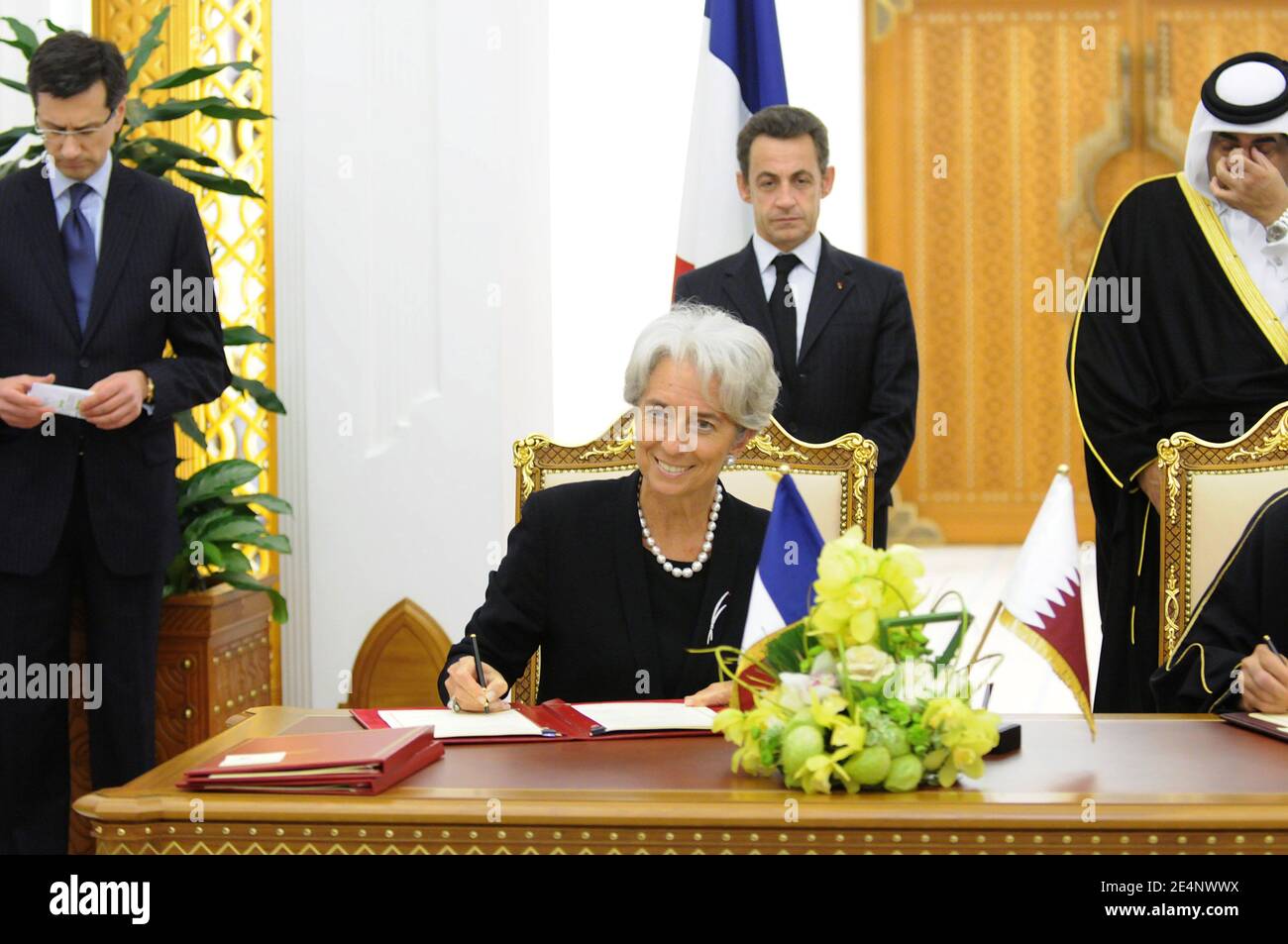 File Photo - Minister Christine Lagarde signs a deal with Qatar, as the Emir Sheikh Hamad Bin Khalifa Al Thani receives President Nicolas Sarkozy at the Emiri Palace in Doha, Qatar, on January 14, 2008, on the second day of his visit to the Arabian Gulf area. France signed with Qatar nuclear and electricity agreements. The European Council announced Tuesday that Lagarde, the current head of the International Monetary Fund, had been chosen to succeed Mario Draghi as president of the European Central Bank,, whose eight-year term ends in October. Photo by Ammar Abd Rabbo/ABACAPRESS.COM Stock Photo