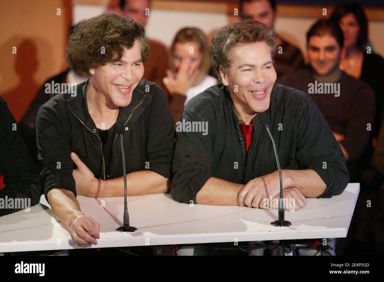 French TV anchors Grichka (L) and Igor Bogdanoff, attends the taping of a radio show in Paris, France on January 22, 2008. Photo by Greg Soussan/ABACAPRESS.COM Stock Photo
