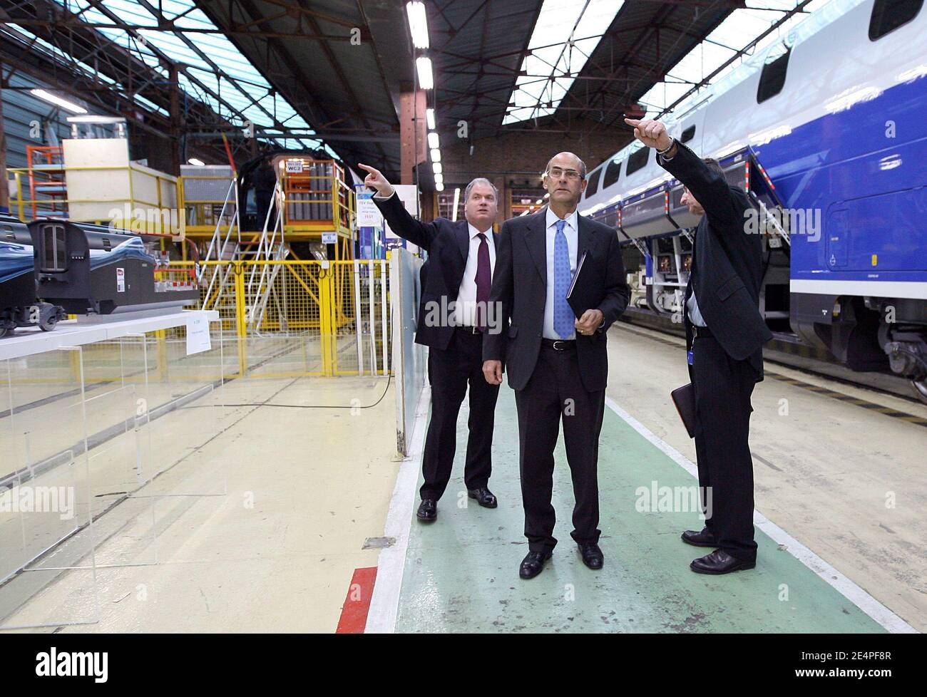 Alstom president Philippe Mellier, Alstom CEO Patrick Kron and Alstom factory director Georges Lacaze pose in the Alstom factory site in Aytre, western France, on February 5, 2008. Photo by Romuald Meigneux/Pool/ABACAPRESS.COM Stock Photo