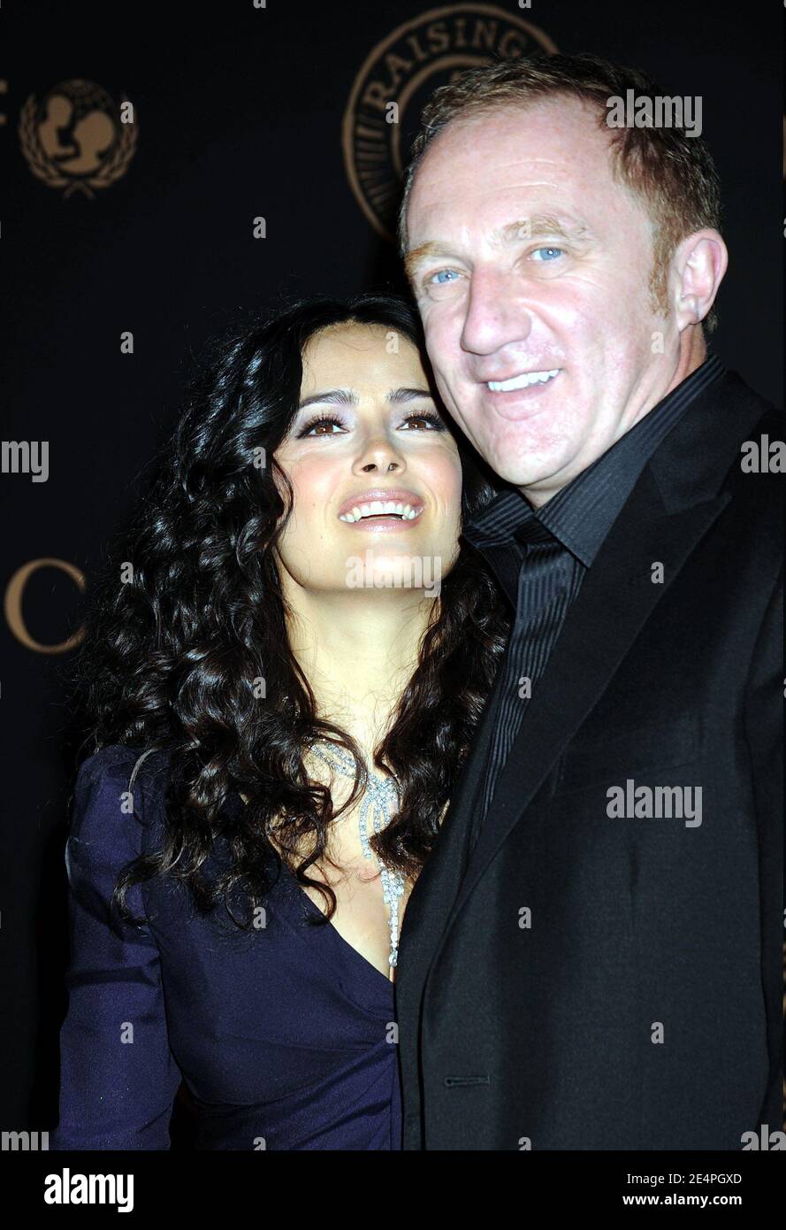 Salma Hayek wearing Gucci and husband Francois-Henri Pinault arriving for the Gucci and Madonna host A Night To Benefit Raising Malawi and Unicef, held at the United Nations Plaza in New York City, NY, USA, February 6, 2008. Photo by David Miller/ABACAPRESS.COM Stock Photo