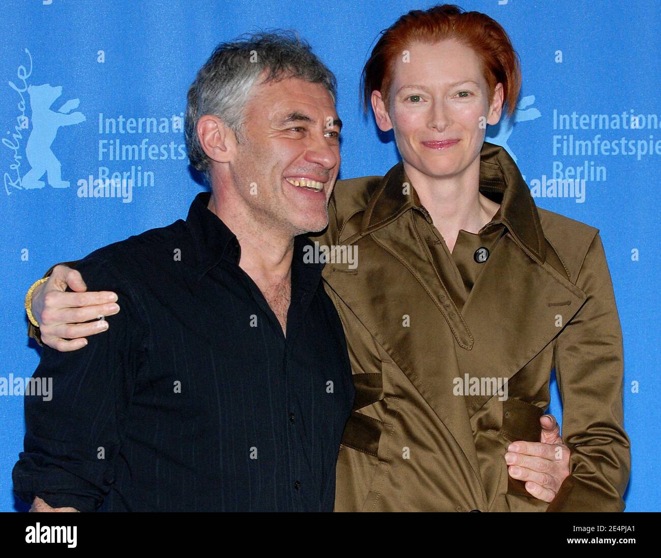 Director Erick Zonca and cast member Tilda Swinton pose for pictures