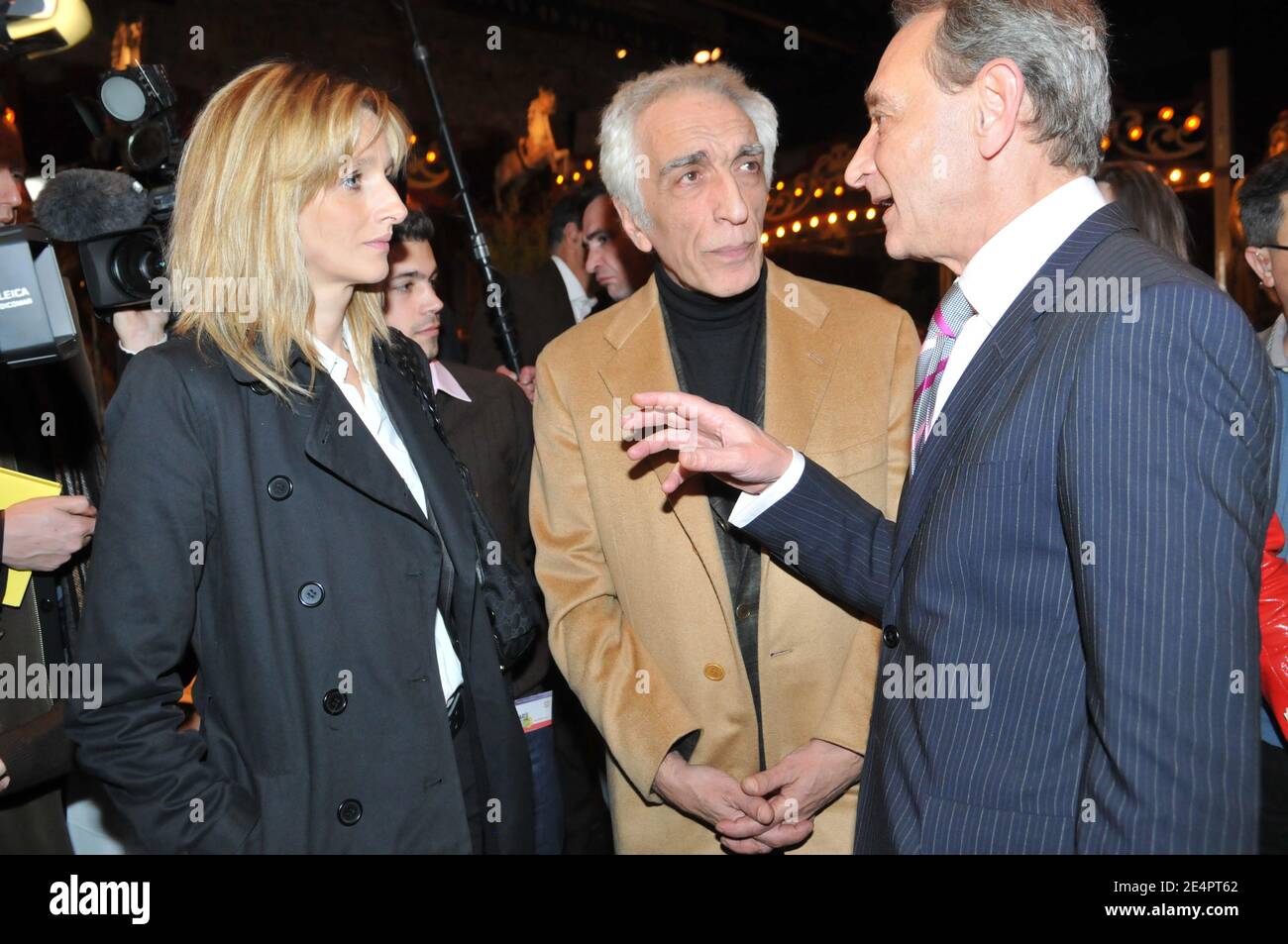 Paris Mayor Bertrand Delanoe and French actor Gerard Darmon and his girlfriend seen during a meeting to support Bertrand Delanoe for mayoral elections at the 'Musee des Arts Forains' in Paris, France, on February 18, 2008. Photo by Ammar Abd Rabbo/ABACAPRESS.COM Stock Photo