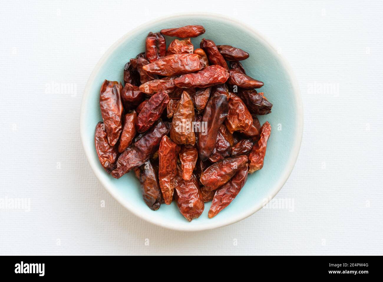 Dried Birdseye Chilis in a Bowl Stock Photo