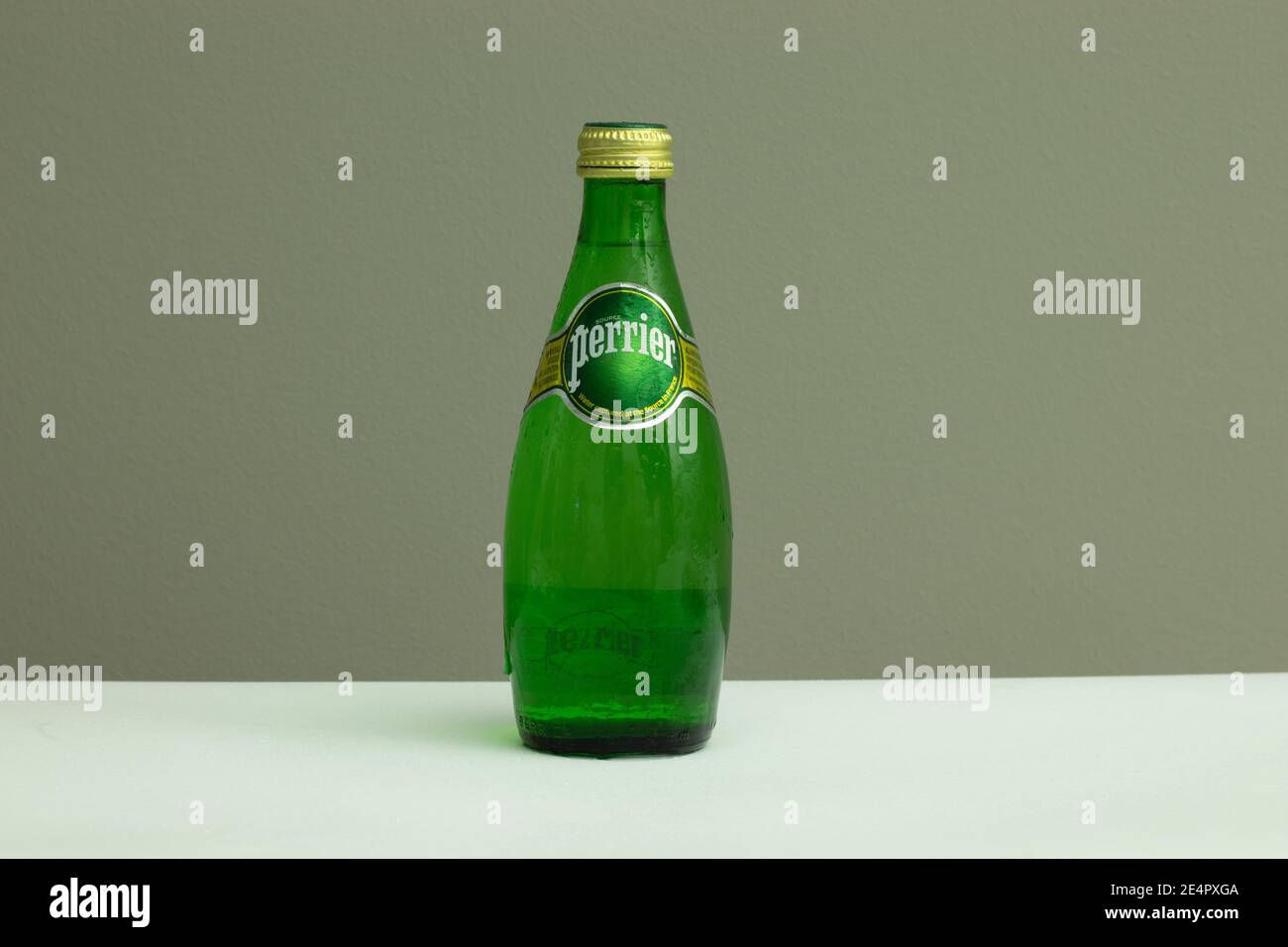 New York, USA - 1 January 2021: Perrier water bottle with copy space, Illustrative Editorial Stock Photo