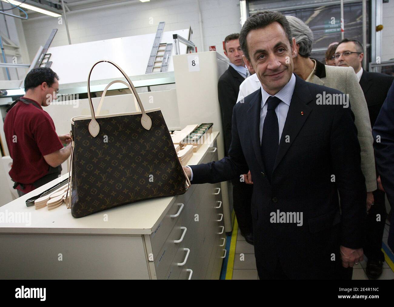 French President Nicolas Sarkozy visits the manufacture of Louis Vuitton in  Saint-Pourcain-sur-Sioule, France on February 26, 2008. Photo by  Mousse/ABACAPRESS.COM Stock Photo - Alamy