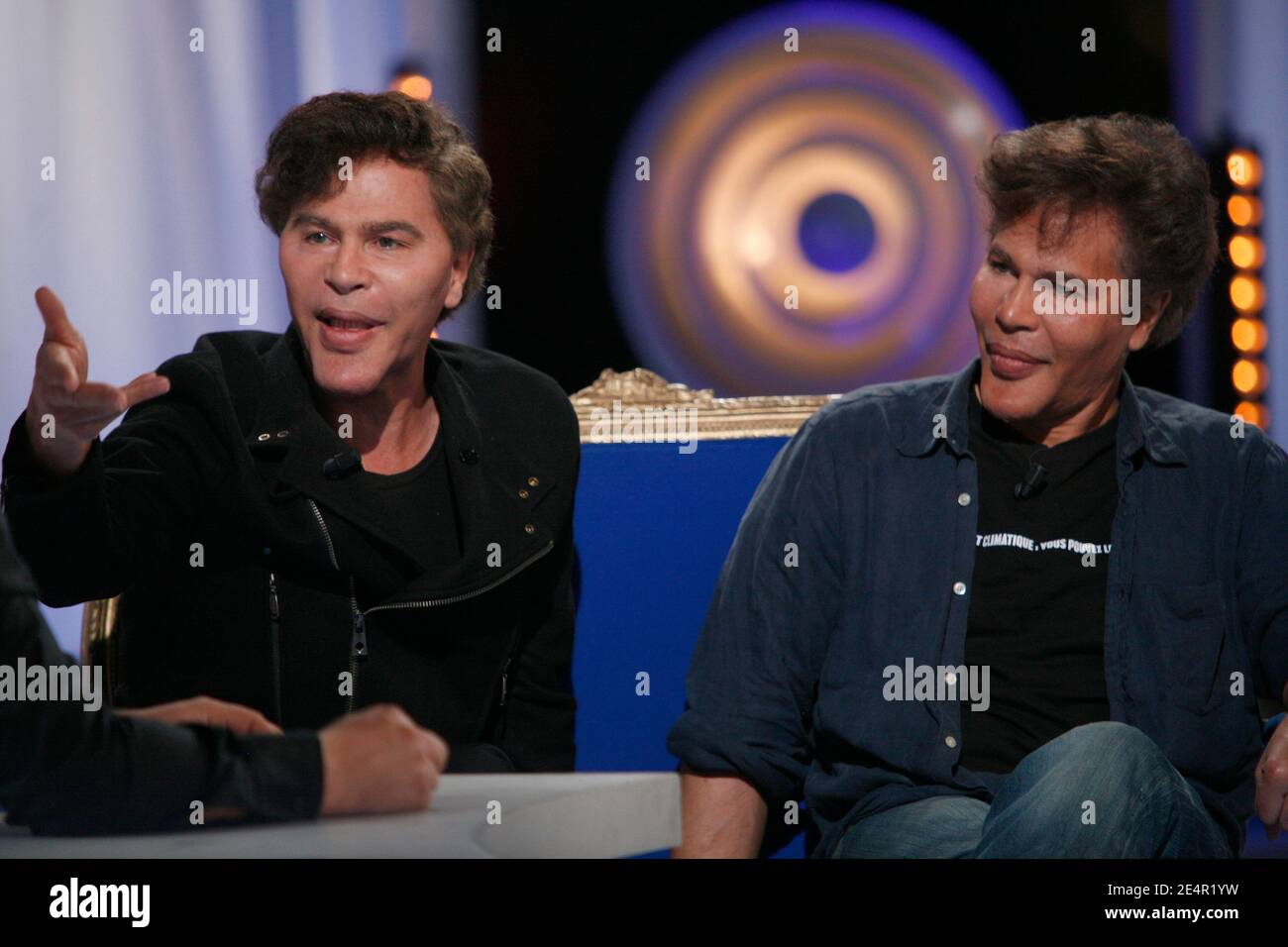 EXCLUSIVE - Grichka Bogdanoff and Igor Bogdanoff attend the taping of a TV show in Paris, France on February 25, 2008. Photo by Greg Soussan/ABACAPRESS.COM Stock Photo