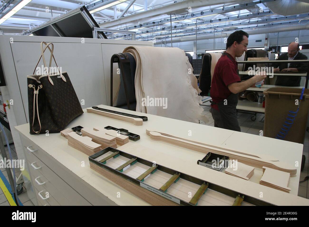 Illustration of the manufacture of Louis Vuitton in  Saint-Pourcain-sur-Sioule, France on February 26, 2008. Photo by  Mousse/ABACAPRESS.COM Stock Photo - Alamy