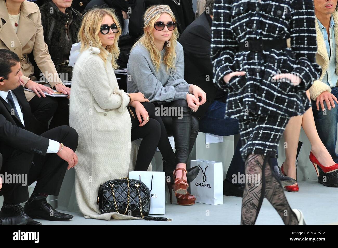 Mary-Kate and Ashley Olsen attend the Chanel Fall-Winter 2008-2009  Ready-to-Wear collection show, held at the Grand Palais, in Paris, France  on February 29, 2008. Photo by  Guignebourg-Nebinger-Orban-Taamallah/ Stock Photo - Alamy