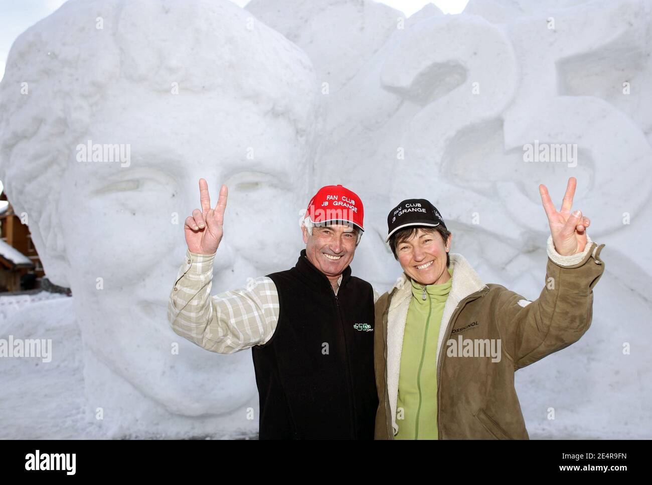 French skiing champion Jean-Baptiste Grange's parents, Jean-Pierre and  Annick, pose for our photographer in front of Jean Baptiste Grange's ice  sculpture in Valloire, Savoie, France on January 26, 2008. Photo by Vincent