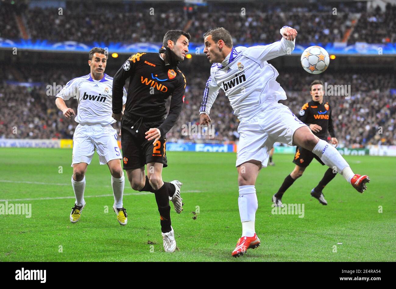 AS Roma's Christian Panucci and Real Madrid's Roberto Soldado battle for the ball in the air during the Champions League first knockout round second leg soccer match, Real Madrid vs AS Roma at the Santiago Bernabeu Stadium in Madrid, Spain on March 5, 2008. AS Roma won the match 2-1 and sending the Spanish team out of the first knockout round for the fourth season in a row. Photo by Steeve McMay/Cameleon/ABACAPRESS.COM Stock Photo