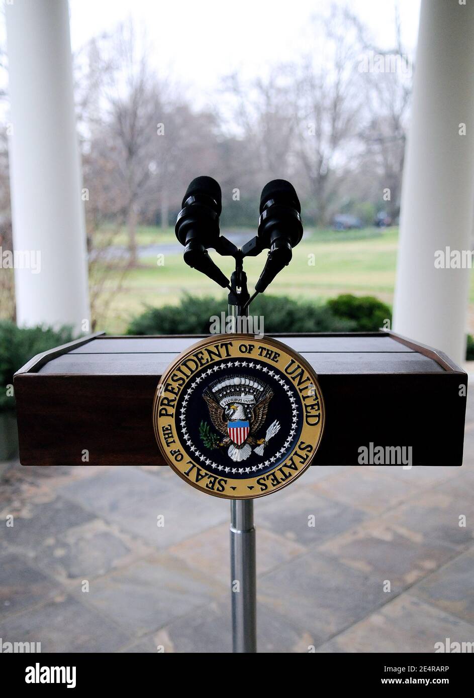 A podium with the seal of the President of the United States stands