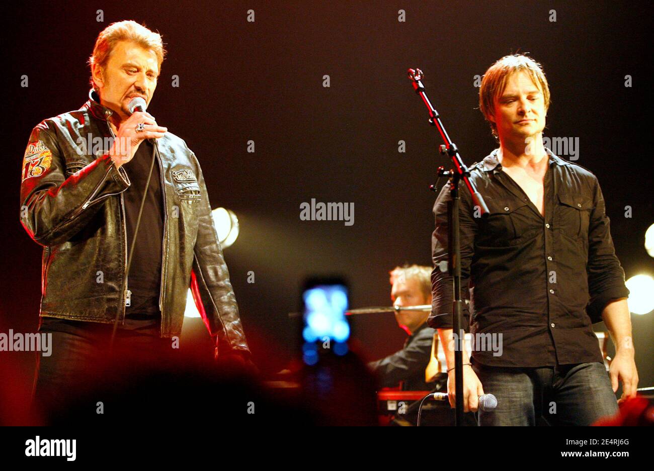 File photo : David Hallyday and his father Johnny Hallyday on stage at the Cigale in Paris on March 17, 2008. France's biggest rock star Johnny Hallyday has died from lung cancer, his wife says. He was 74. The singer - real name Jean-Philippe Smet - sold about 100 million records and starred in a number of films. Photo by Marco Vitchi/ABACAPRESS.COM Stock Photo